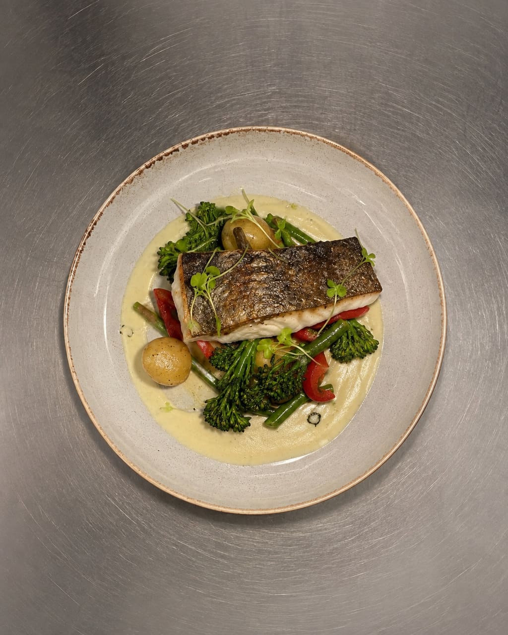 The same dish, photographed properly: carried to the window before service, shot from the side at plate height, nothing else on the table.