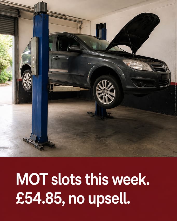 The daylight workshop photograph from section 04, untouched, with the words “MOT slots this week. £54.85, no upsell” on a dark red panel at the foot.